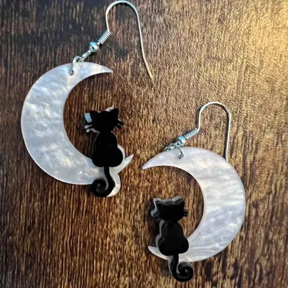 1 pair of Halloween earrings, black cat sitting on a white half moon